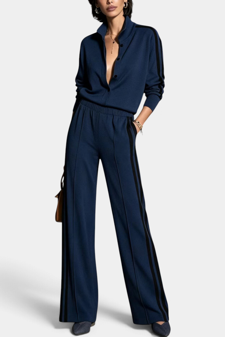 Mahaute Kimi navy blue buttoned jacket and wide-leg trousers set with black side stripes on a model