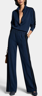Mahaute Kimi navy blue buttoned jacket and wide-leg trousers set with black side stripes on a model