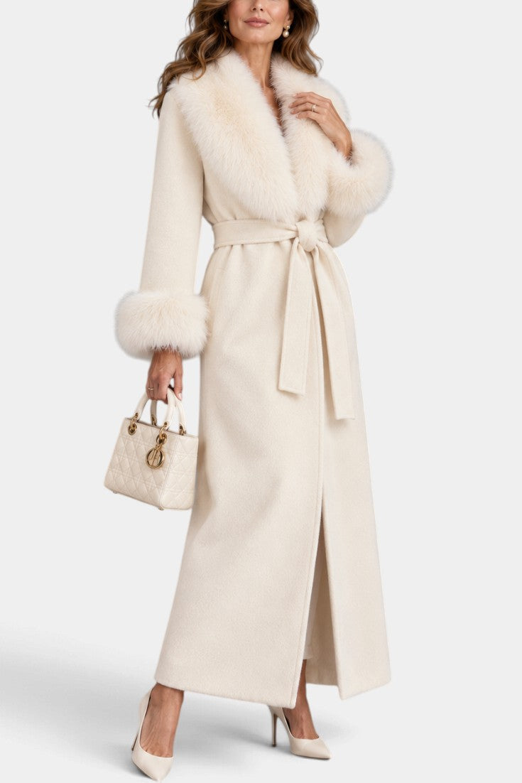 Mahaute Lalie long cream coat with faux fur collar and cuffs, featuring a belted waist and elegant tailored fit.