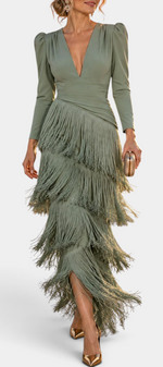 Mahaute Laurentia sage green long dress with deep V-neck, structured puff sleeves, and tiered fringe skirt details.