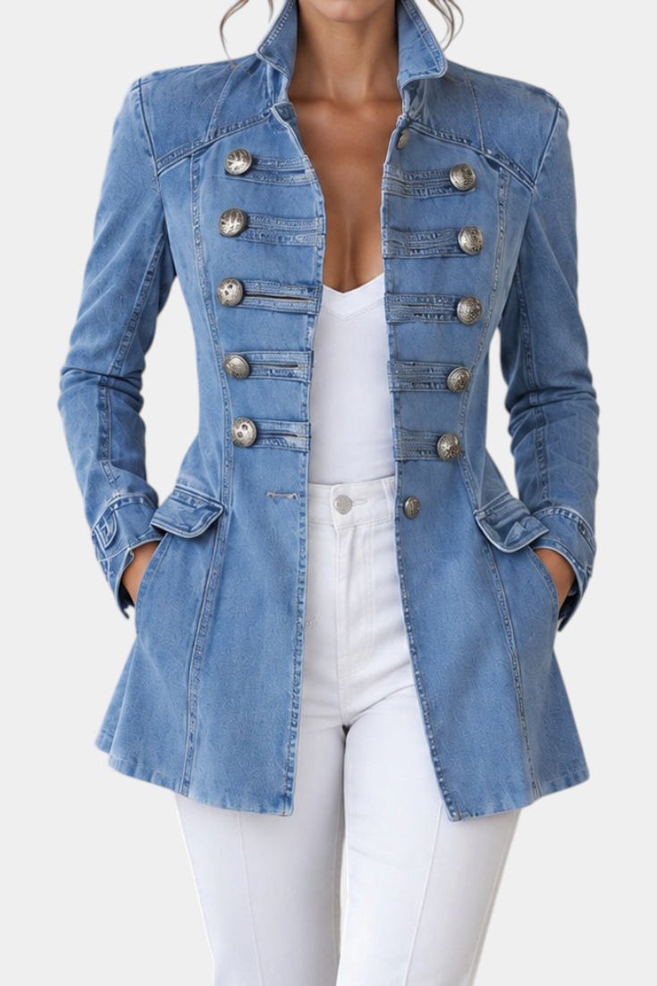 Mahaute light blue denim jacket with decorative silver buttons and a tailored retro-inspired fit.
