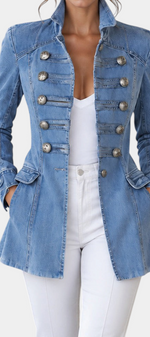 Mahaute light blue denim jacket with decorative silver buttons and a tailored retro-inspired fit.