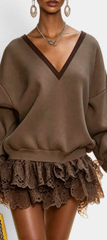 Mahaute Lilou brown short dress featuring an oversized sweatshirt top with a V-neck and a tiered lace ruffle skirt.