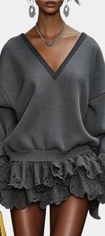 Mahaute Lilou charcoal grey short dress with deep V-neck, oversized sweatshirt top, and layered lace ruffle skirt.