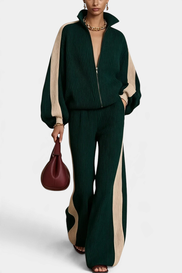 Mahaute Luella ribbed knit set featuring a dark green zip-up jacket and wide-leg trousers with beige side stripes.