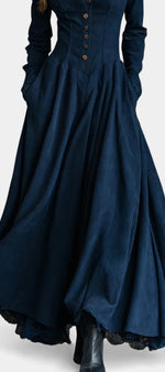 Mahaute long navy blue faux suede shirt dress with a fitted waist and flared skirt featuring button-down front
