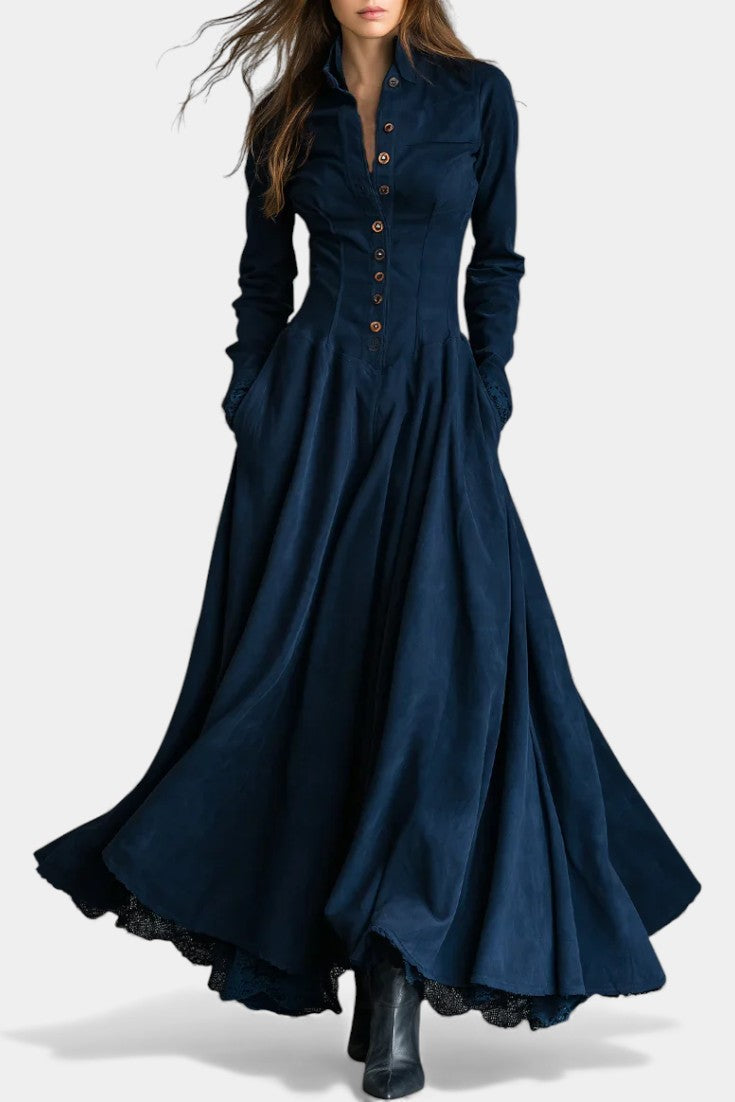 Mahaute Maravilla long navy blue faux suede shirt dress with a fitted waist, button-down front, and flared skirt.