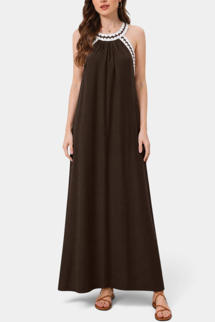 Robe longue fluide Mahaute Marjolein avec col américain, finition contrastée, style élégant et décontracté.