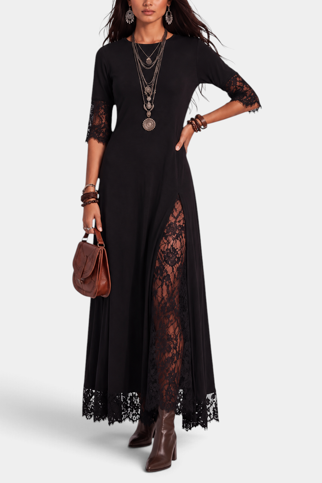 Mahaute Meliorine black maxi dress with floral lace sleeves, side panels, and hem detail on a model.