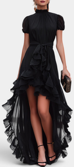 Mahaute Melusina black high-low evening dress with ruffled hem, puffed sleeves, and a tied waist for formal events.