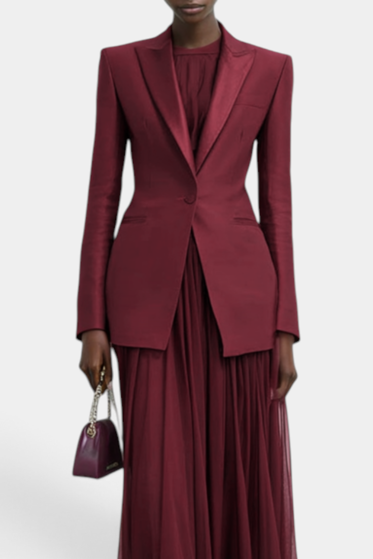 Mahaute Merryn burgundy two-piece set featuring a structured blazer and a flowing pleated maxi dress for formal wear.