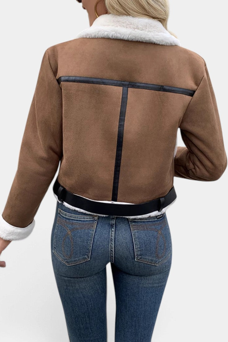 Back view of Mahaute Monet short faux suede jacket in brown with white faux fur collar and black trim details.