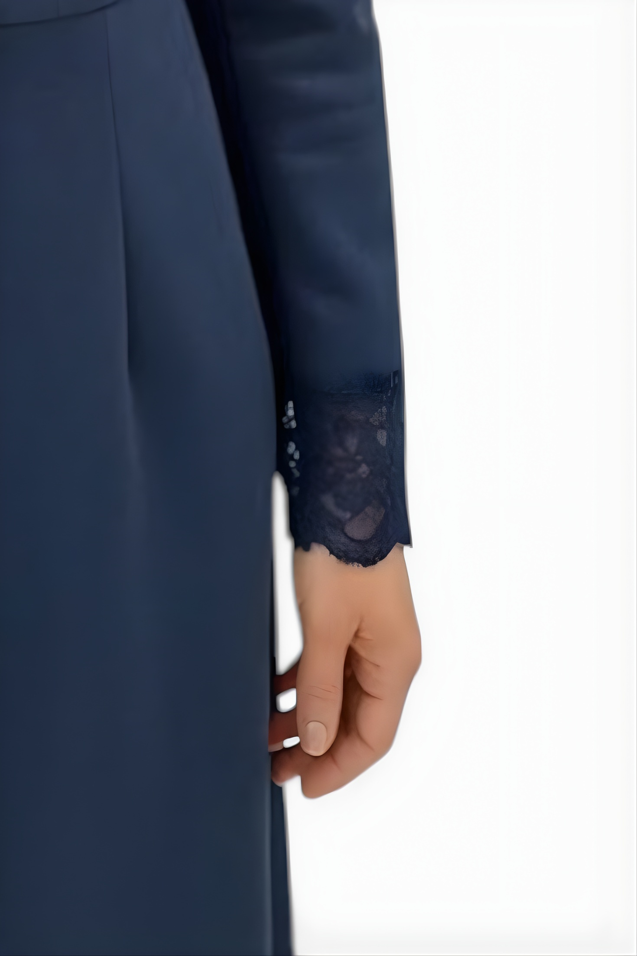 Close-up of Mahaute navy blue suede-effect long dress sleeve featuring delicate lace trim detail at the cuff
