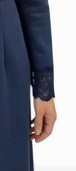 Close-up of Mahaute navy blue suede-effect long dress sleeve featuring delicate lace trim detail at the cuff