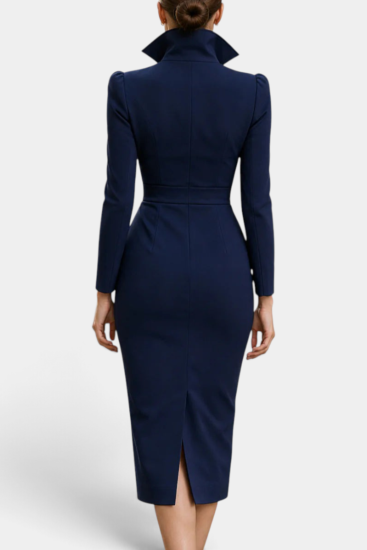 Back view of a Mahaute navy blue midi dress with a structured high collar, cinched waist, and back slit.