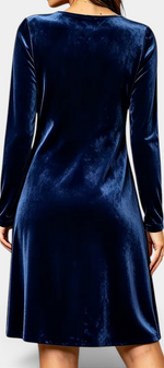 Back view of a Mahaute navy blue velvet short dress with long sleeves and a flared silhouette.