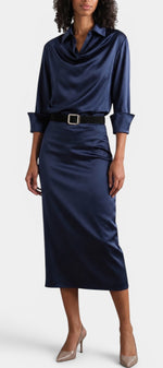 Mahaute navy blue satin midi shirt dress with a draped bodice, long sleeves, and a square buckle belt.