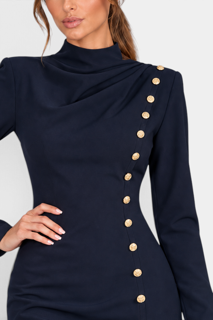 Mahaute navy blue short fitted dress with a draped high neckline, structured shoulders, and asymmetric gold buttons.