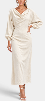 Mahaute Nicole long cream dress with draped cowl neck, balloon sleeves, and fitted waist on a model.