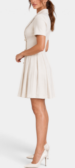 Mahaute Ognyana beige short blazer dress with double-breasted buttons and a pleated skirt, side view