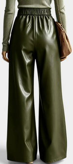 Mahaute Camellia wide-leg trousers in olive green faux leather with an elasticated waist, back view.
