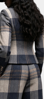 Back view of Mahaute Paca plaid blazer and high-waisted trousers set in navy and beige wool blend.