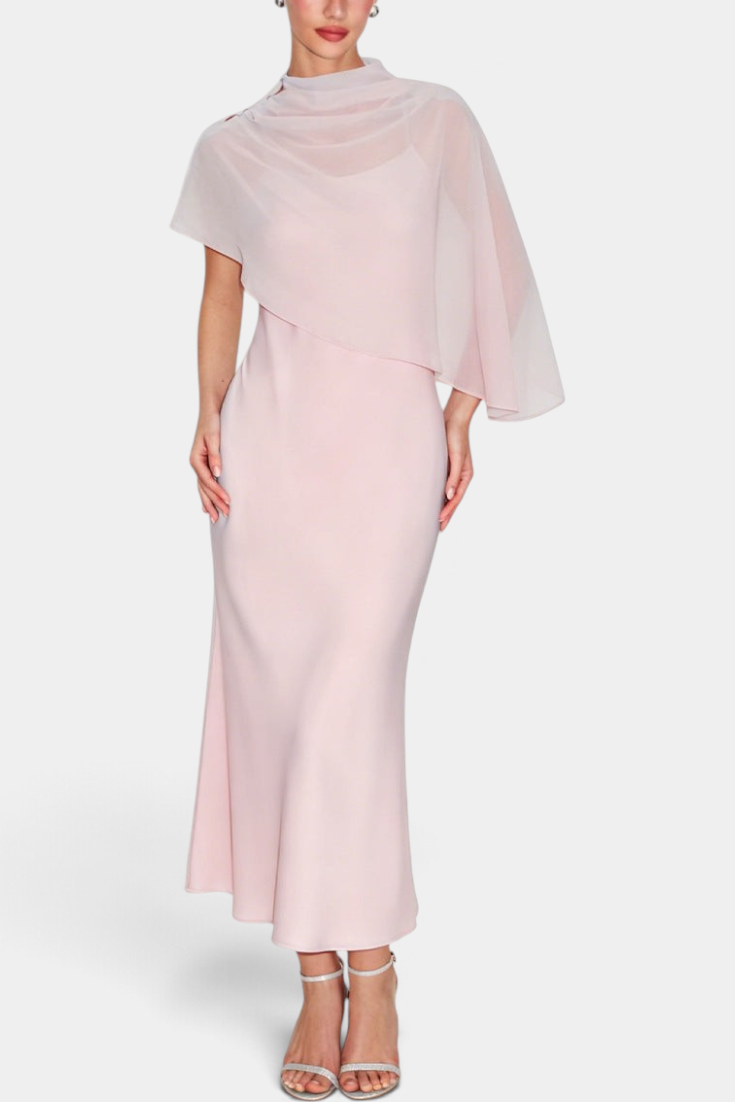 Mahaute midi satin dress in pale pink featuring an asymmetrical cape overlay and elegant draped neckline