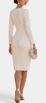 Back view of Mahaute Pearce cream midi dress with long sleeves, fitted silhouette, and structured tailoring.