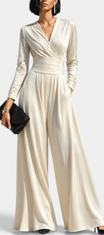 Mahaute Petronella cream satin wrap-front jumpsuit with long sleeves, high waist, and wide-leg trousers.
