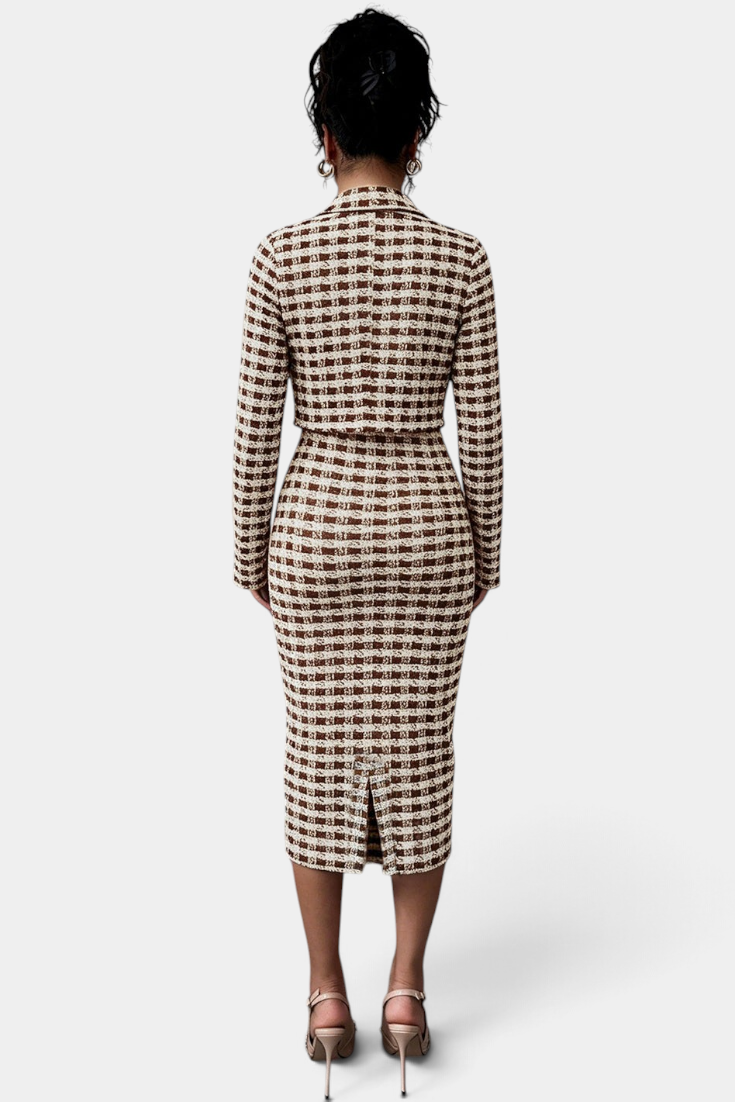 Back view of Mahaute Kalina midi dress and blazer set in brown and white plaid tweed with a back slit