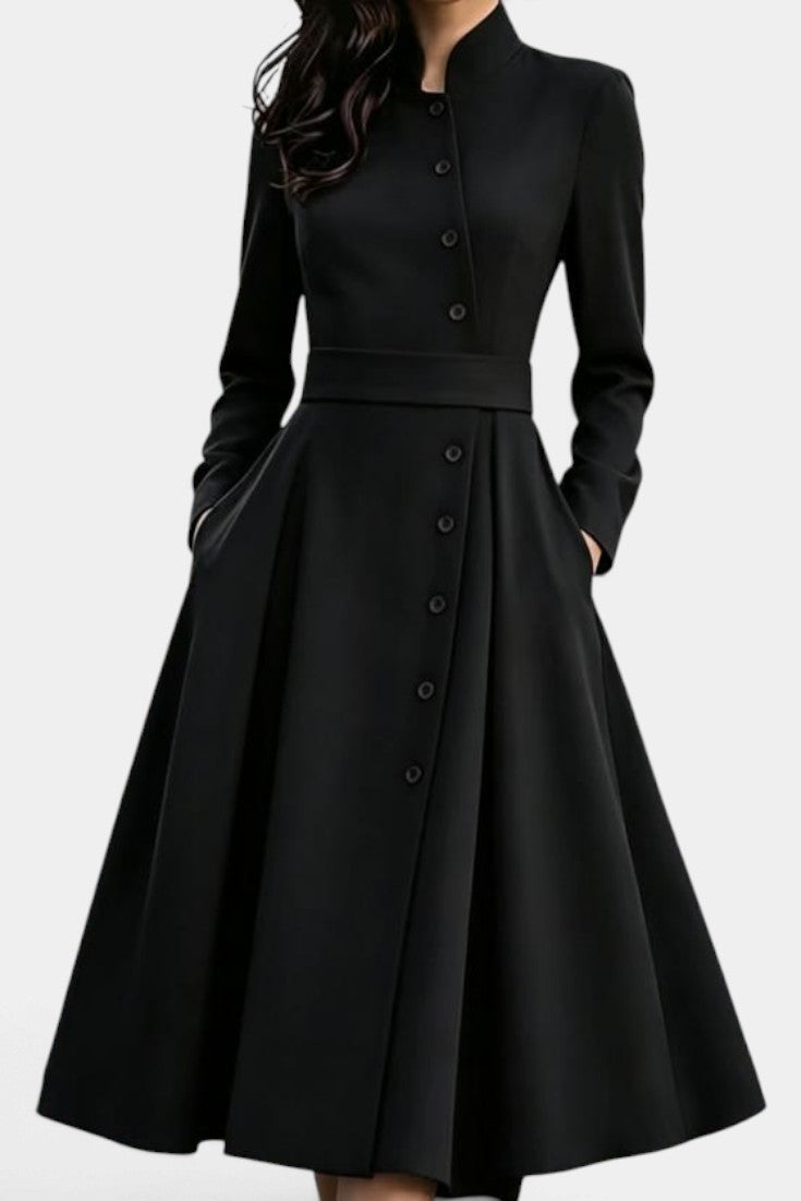 Mahaute Prague black midi dress with a structured high collar, front button closure, and a belted waist.