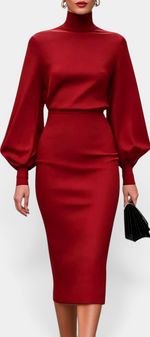 Mahaute Celandine red midi dress with high neck and voluminous balloon sleeves in a sophisticated pencil silhouette.
