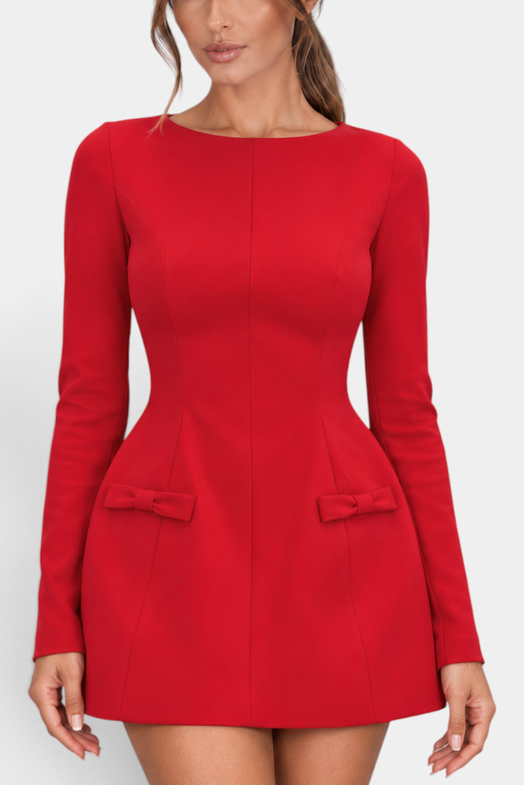 Mahaute red structured short dress with long sleeves, cinched waist, and decorative bow details on the hips.