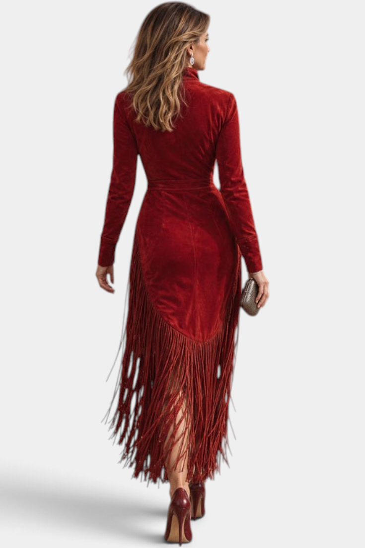 Mahaute red velvet midi dress with long fringe hem and long sleeves, back view on a woman wearing heels.