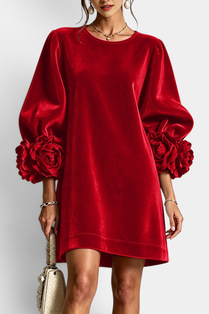 Mahaute red velvet short dress with voluminous puff sleeves and 3D floral details on the cuffs.