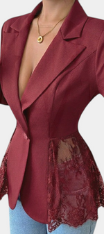Mahaute Rivellea burgundy tailored blazer with floral lace side panels and a single button closure.