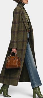 Mahaute Rosamund long plaid coat with tailored collar worn by a model with a hat, jeans, and green boots