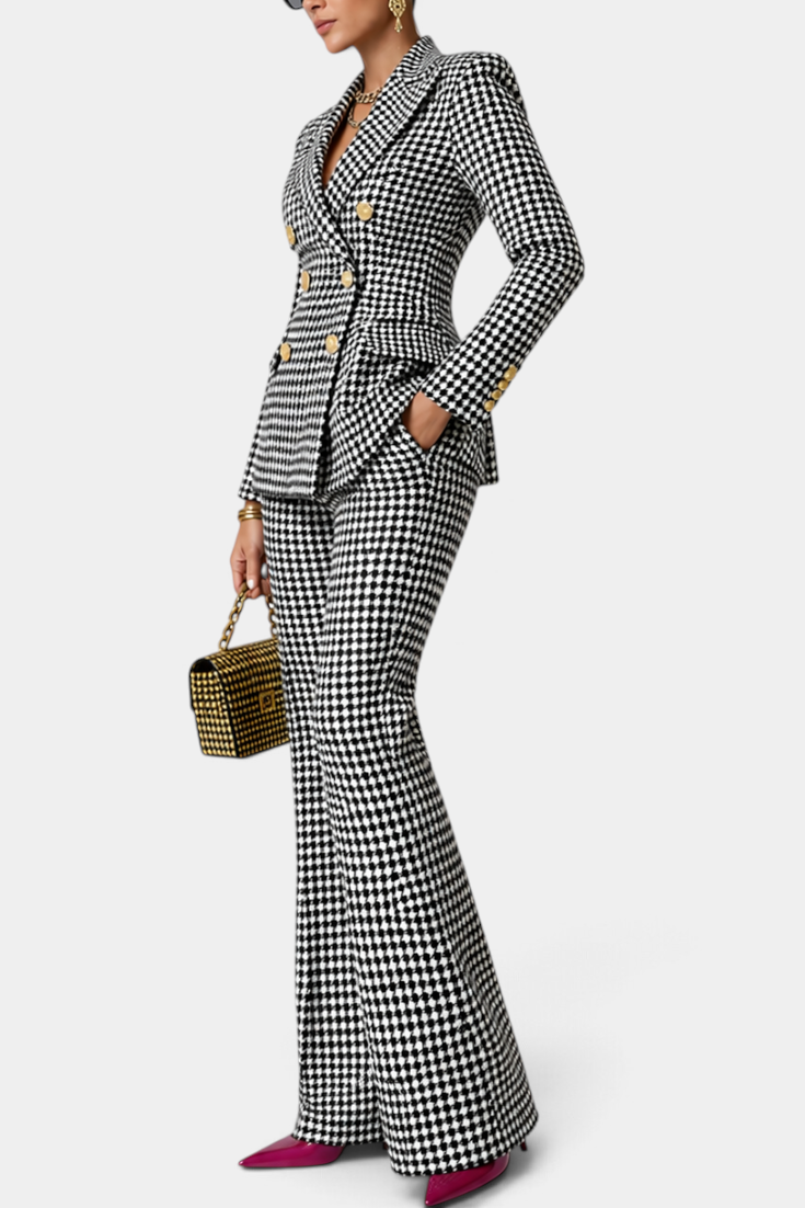 Mahaute Rumyana houndstooth double-breasted blazer and flared trousers suit with gold buttons on a model