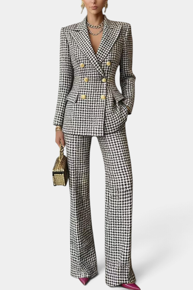 Mahaute Rumyana houndstooth double-breasted blazer and flared trousers suit with gold buttons on a model
