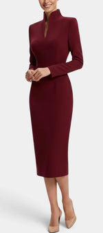 Mahaute Sandy burgundy midi dress with a high slit collar, long sleeves, and a fitted silhouette on a model.