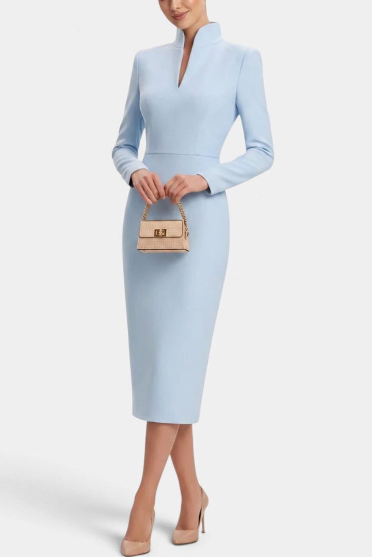 Mahaute Sandy light blue midi dress with a high split collar, long sleeves, and a fitted silhouette.