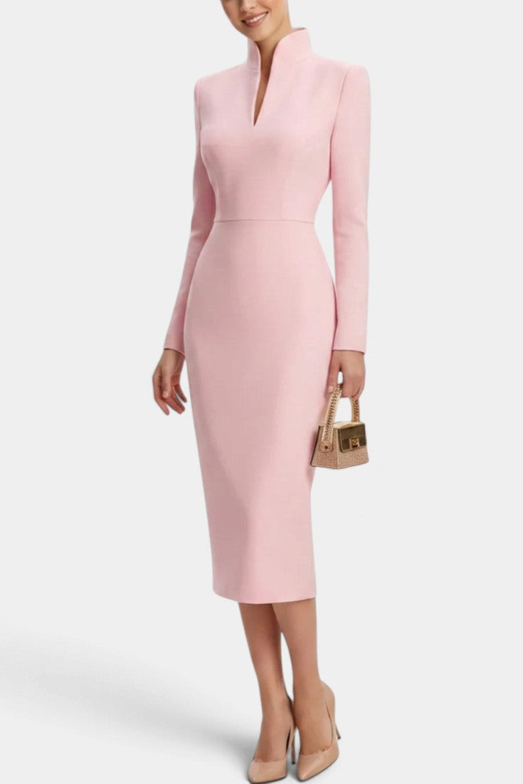 Mahaute Sandy midi dress in soft pink with a high split neckline, long sleeves, and a fitted silhouette.
