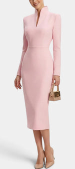 Mahaute Sandy midi dress in soft pink with a high split neckline, long sleeves, and a fitted silhouette.