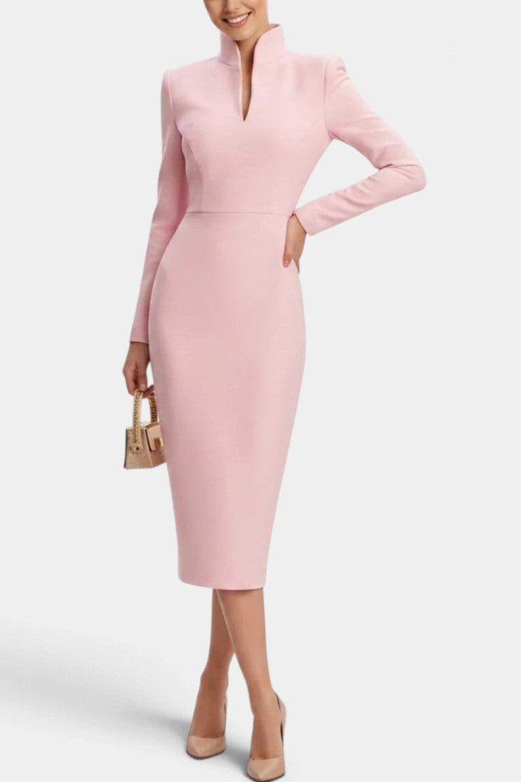 Mahaute Sandy light pink midi dress with a high split collar, long sleeves, and a fitted silhouette on a model.