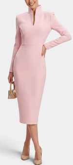 Mahaute Sandy light pink midi dress with a high split collar, long sleeves, and a fitted silhouette on a model.