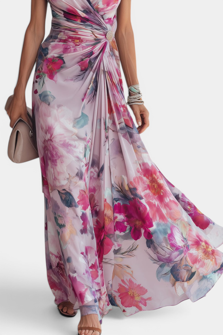 Mahaute Sanna long floral wrap dress with watercolor print, draped waist, and jewel button detail on a model.