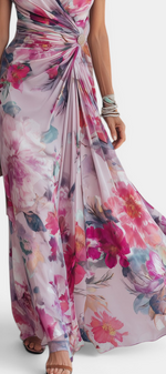 Mahaute Sanna long floral wrap dress with watercolor print, draped waist, and jewel button detail on a model.