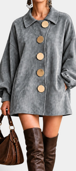 Mahaute Sestina short grey faux suede dress with oversized gold buttons, balloon sleeves, and side pockets.