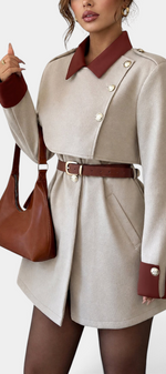 Mahaute short beige coat with contrast burgundy collar, cuffs, belt, and gold buttons.
