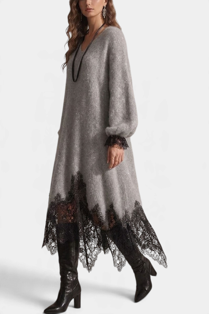 Mahaute Simona grey knit maxi dress with voluminous sleeves and black floral lace asymmetrical hem on a model